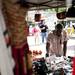 Omar Biallo of Djenne Beads and Oils arranges merchandise during the 18th annual African American Downtown Festival. Daniel Brenner I AnnArbor.com
